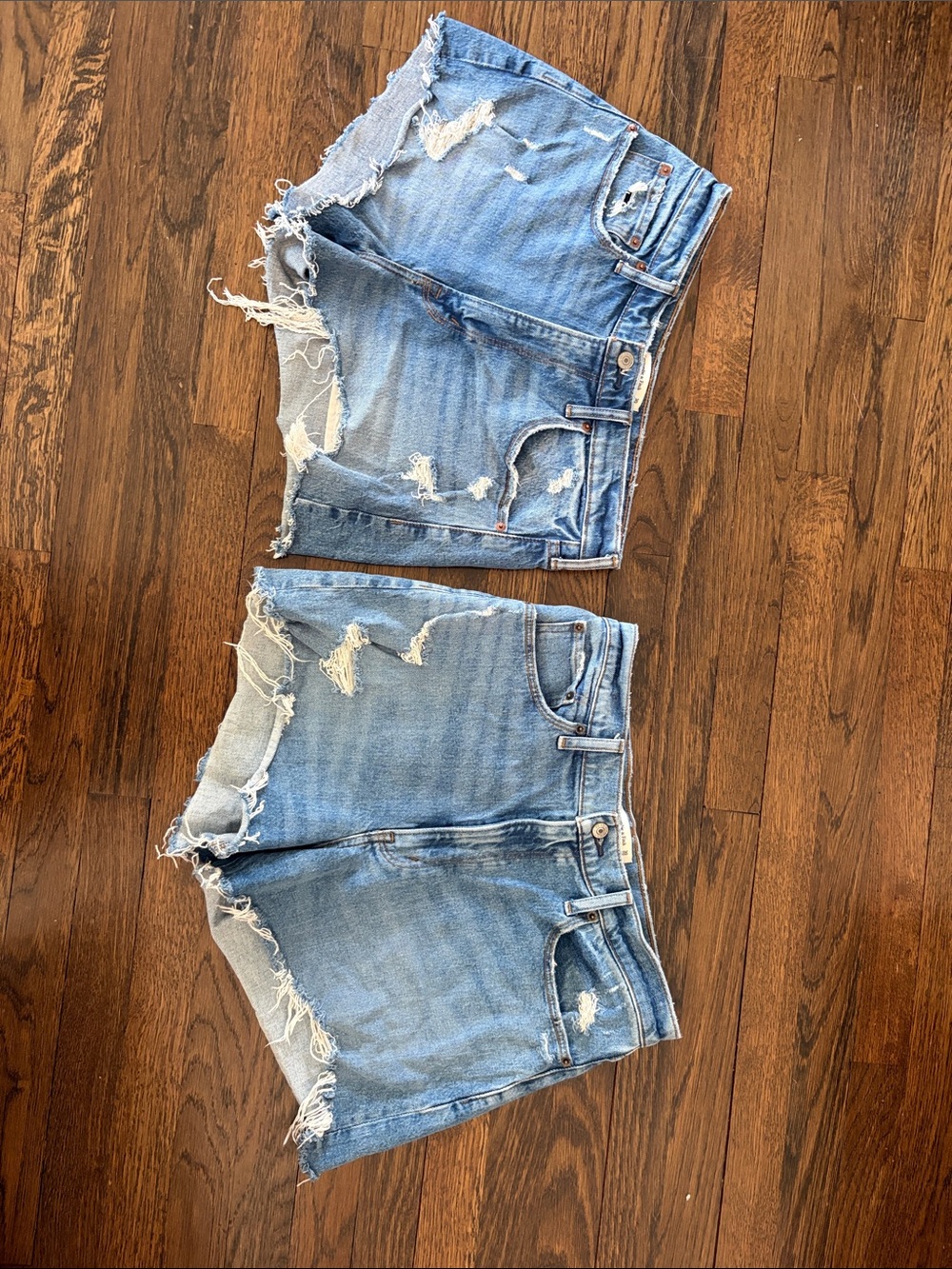 Distressed Light Blue Denim Shorts - Women's